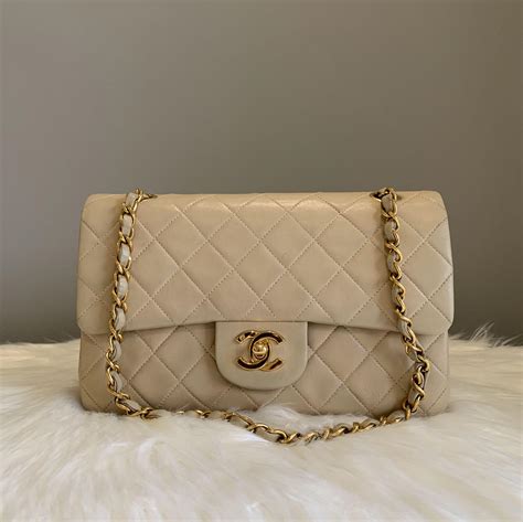 white chanel flap with gold hardware|chanel classic flap bag beige.